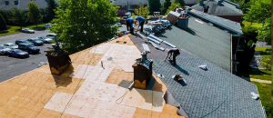 Top Differences Between a Reroof vs. Roof Replacement